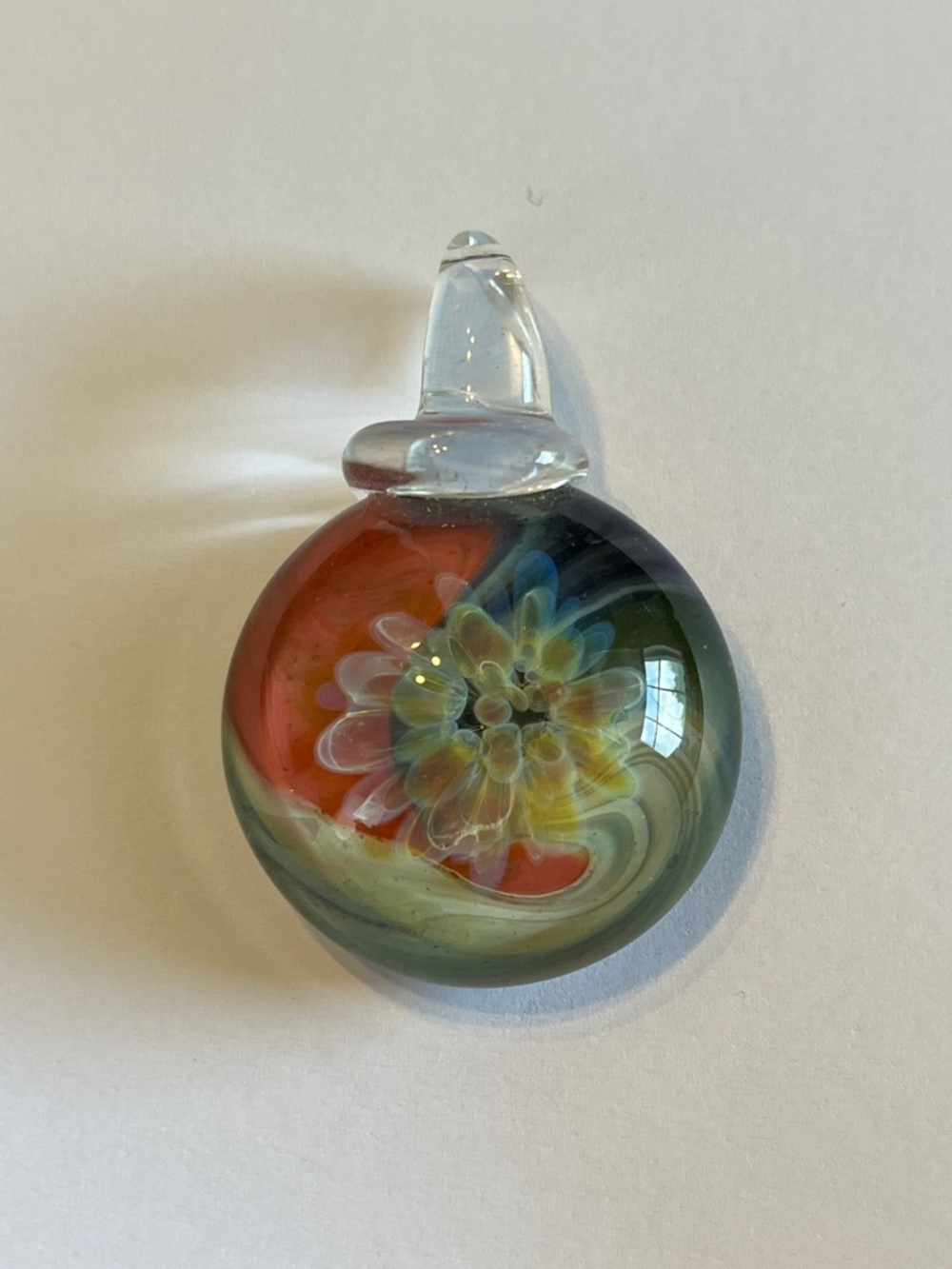 Colorful Swirl Glass Pendant with Floral Core